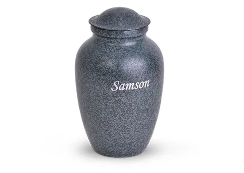 Granite pet urns with personalized engravings.